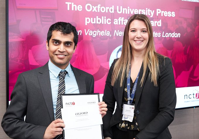 News Associates sports journalism graduate accepting the Oxford University Press public affairs award