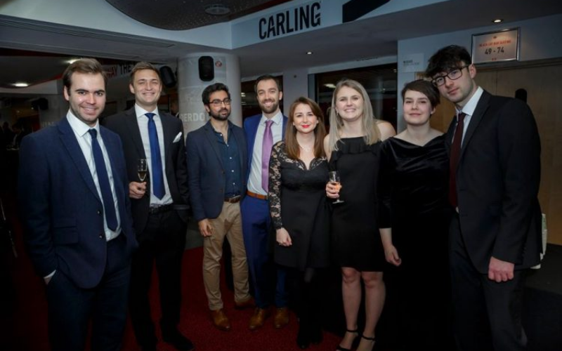 News Associates staff and trainees at the NCTJ Awards for Excellence in Sunderland in 2019. The selection of eight trainees, staff and guests are all very smartly dressed.