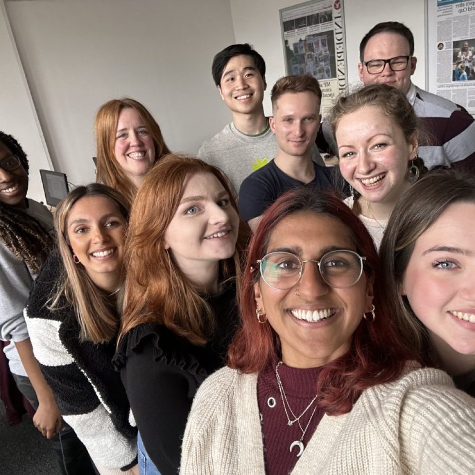 A group of News Associates Manchester trainees smiling for a selfie after covering the Manchester local elections. They are on one of our part-time journalism courses.