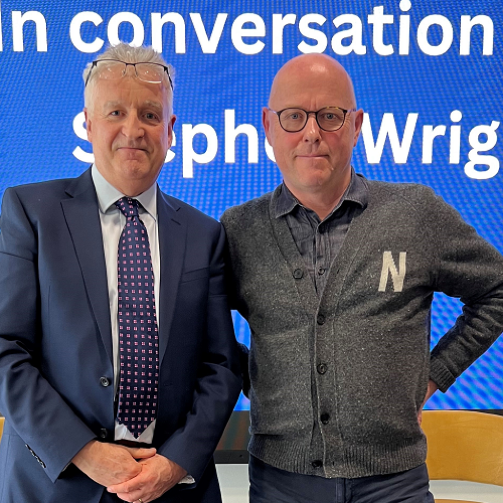 News Associates deputy managing editor Graham Dudman with Daily Mail associate editor Stephen Wright at JournoFest 2024. They are standing next to each other, smiling for the camera.