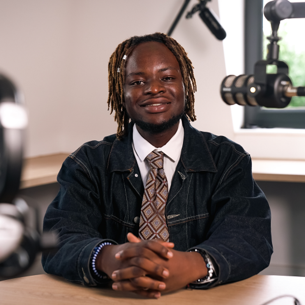 How to be a Journalist podcast host Plamedi in our podcast studio.