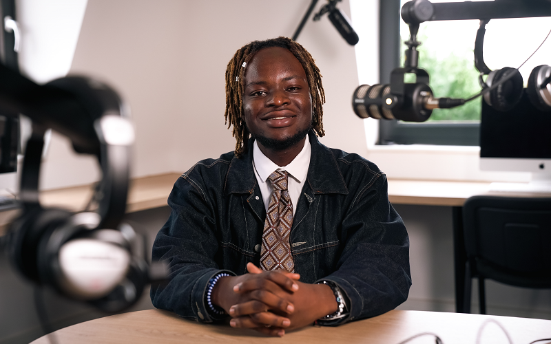 How to be a Journalist podcast host Plamedi in our podcast studio.
